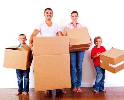 Removal team planning a house move in Longlands with boxes and furniture