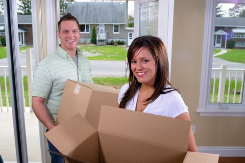 Packed boxes and furniture ready for relocation