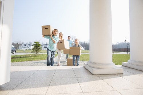 Local movers handling household furniture in Longlands