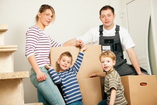 Local moving truck transporting boxes and furniture across Longlands