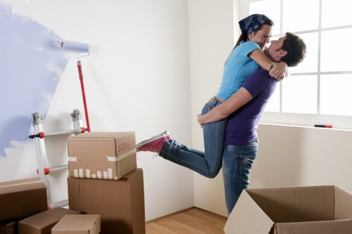Furniture removal team collecting a sofa from a Longlands home