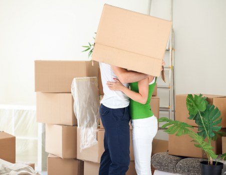 Commercial relocation items being loaded into a removal van near Longlands