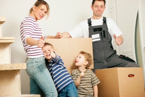 Commercial moving process with labelled boxes and desks